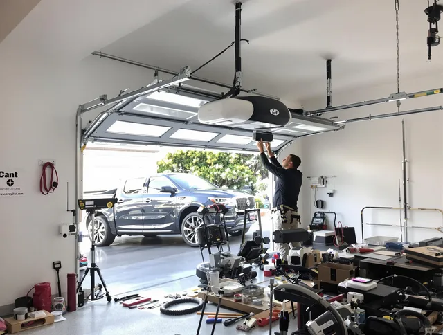 St. Petersburg Garage Door Repair specialist installing smart garage door opener system in St. Petersburg home