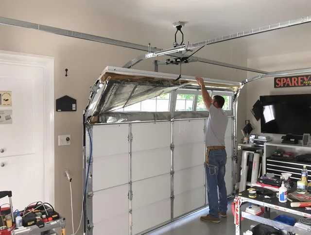 Garage door section replacement by St. Petersburg Garage Door Repair in St. Petersburg